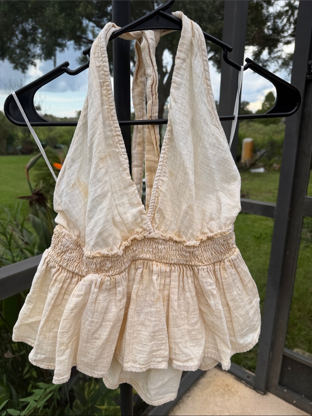 Miami. Kiwi + Punch Light distressed Cream Smocked Halter Peplum Camisole